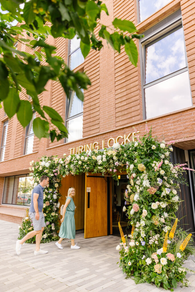 Organic floral and foliage arch created for brand event