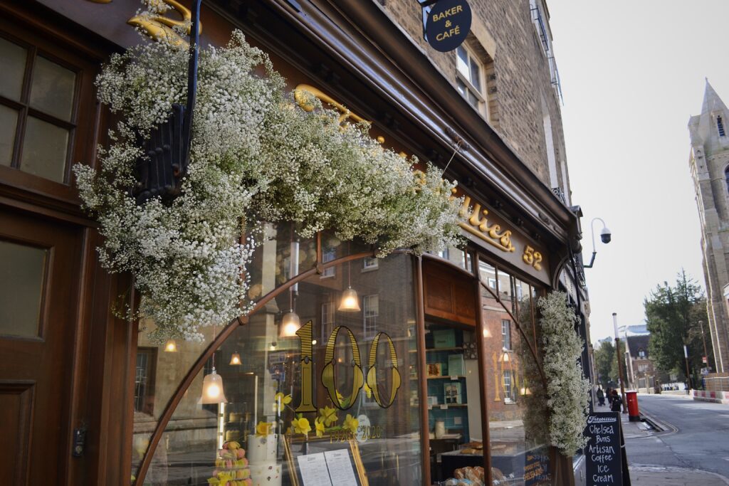 Floral installation for bespoke window display at Cambridge Bakery 